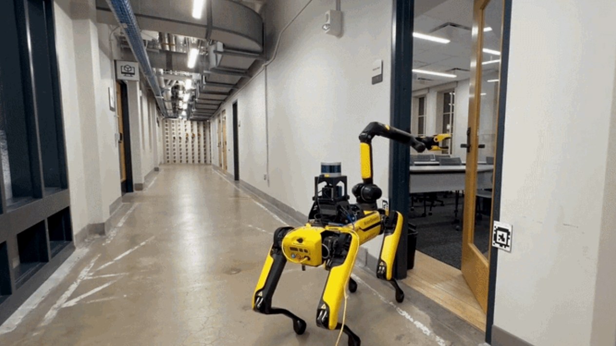 Quadruped robot operating in a facility hallway