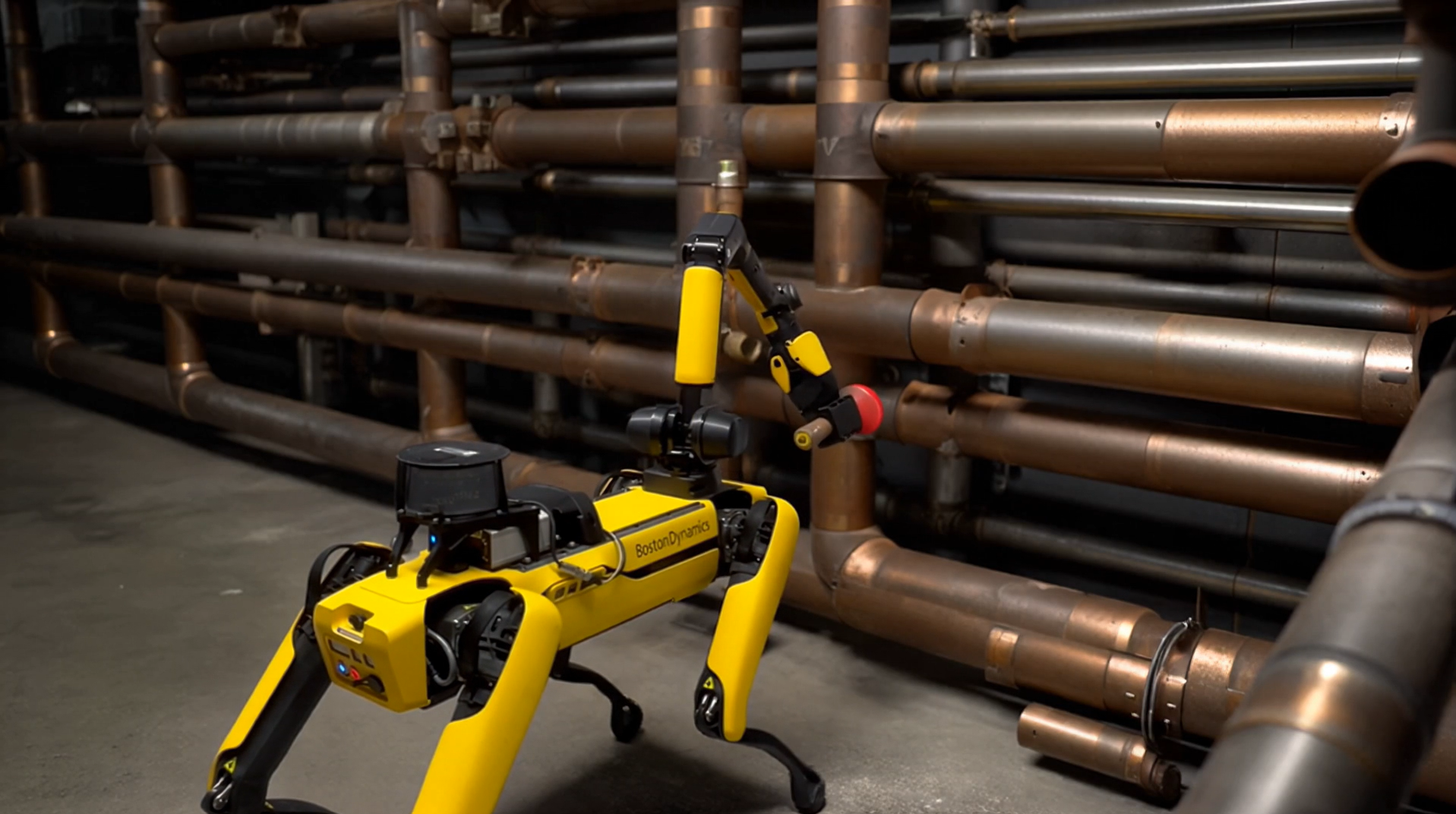 Quadruped robot performing an inspection in an industrial facility